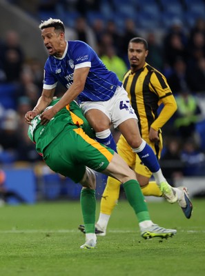 220426 - Cardiff City v Port Vale FC - SkyBet League One - Callum Robinson of Cardiff City collides with Joe Gauci of Port Vale 
