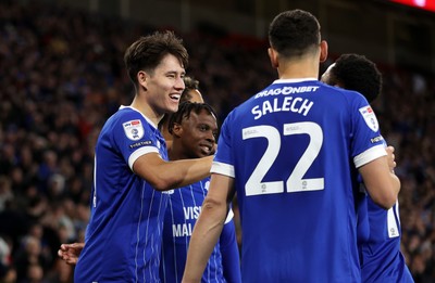 220426 - Cardiff City v Port Vale FC - SkyBet League One - Rubin Colwill of Cardiff City celebrates scoring a goal with team mates