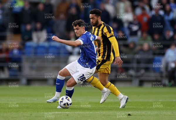 220426 - Cardiff City v Port Vale FC - SkyBet League One - Alex Robertson of Cardiff City is challenged by George Hall of Port Vale 