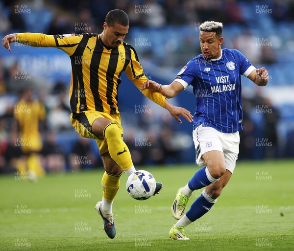 220426 - Cardiff City v Port Vale FC - SkyBet League One - Cameron Humphreys of Port Vale is challenged by Callum Robinson of Cardiff City 