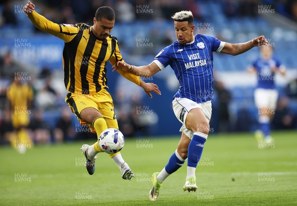 220426 - Cardiff City v Port Vale FC - SkyBet League One - Cameron Humphreys of Port Vale is challenged by Callum Robinson of Cardiff City 