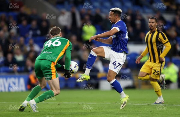220426 - Cardiff City v Port Vale FC - SkyBet League One - Callum Robinson of Cardiff City collides with Joe Gauci of Port Vale 