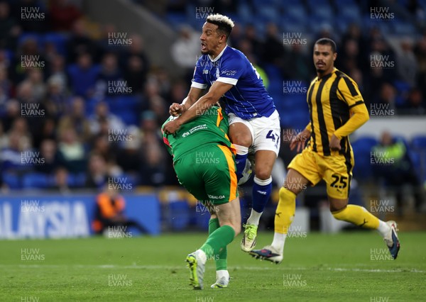 220426 - Cardiff City v Port Vale FC - SkyBet League One - Callum Robinson of Cardiff City collides with Joe Gauci of Port Vale 