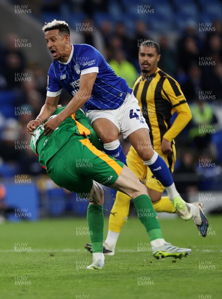 220426 - Cardiff City v Port Vale FC - SkyBet League One - Callum Robinson of Cardiff City collides with Joe Gauci of Port Vale 