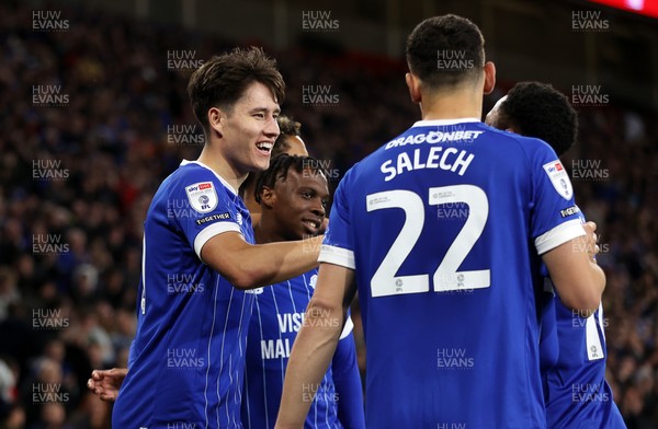 220426 - Cardiff City v Port Vale FC - SkyBet League One - Rubin Colwill of Cardiff City celebrates scoring a goal with team mates