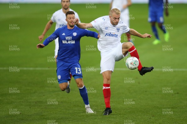 080817 - Cardiff City v Portsmouth, Carabao Cup, Round 1 - Anthony Pilkington of Cardiff City and Jack Whatmough of Portsmouth compete for the ball