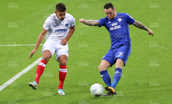 080817 - Cardiff City v Portsmouth, Carabao Cup, Round 1 - Lee Tomlin of Cardiff City is challenged by Gareth Evans of Portsmouth