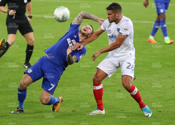 080817 - Cardiff City v Portsmouth, Carabao Cup, Round 1 - Lee Tomlin of Cardiff City and Gareth Evans of Portsmouth tangle as they look to win the ball