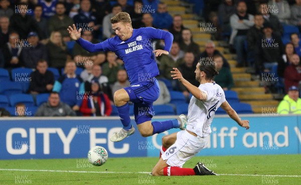 080817 - Cardiff City v Portsmouth, Carabao Cup, Round 1 - Danny Ward of Cardiff City is challenged by Christian Burgess of Portsmouth