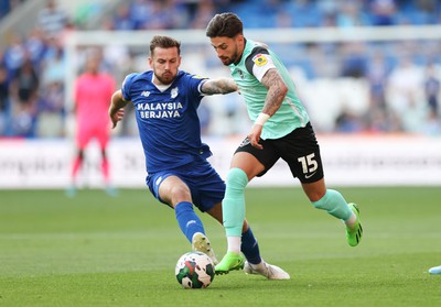 090822 - Cardiff City v Portsmouth, EFL Carabao Cup - Owen Dale of Portsmouth takes on Joe Ralls of Cardiff City