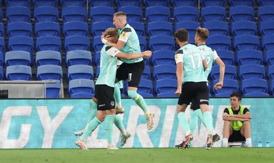 090822 - Cardiff City v Portsmouth, EFL Carabao Cup - Joe Pigott of Portsmouth celebrates with team mates after he scores the first goal of the match