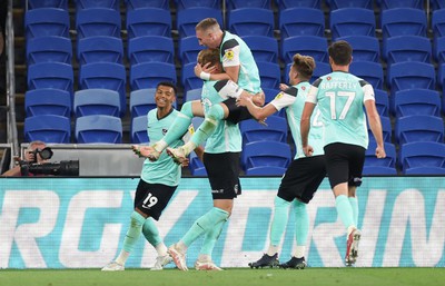 090822 - Cardiff City v Portsmouth, EFL Carabao Cup - Joe Pigott of Portsmouth celebrates with team mates after he scores the first goal of the match