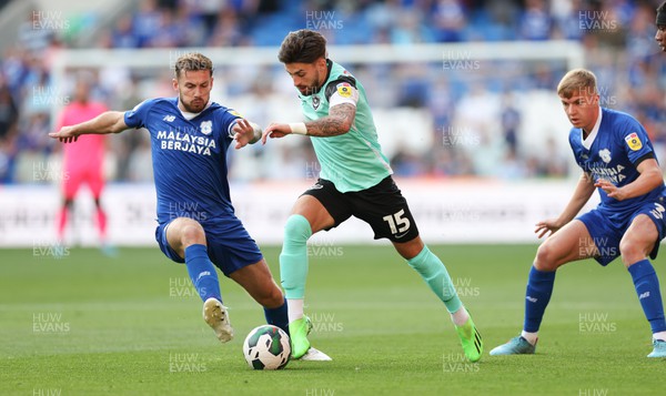 090822 - Cardiff City v Portsmouth, EFL Carabao Cup - Owen Dale of Portsmouth takes on Joe Ralls of Cardiff City