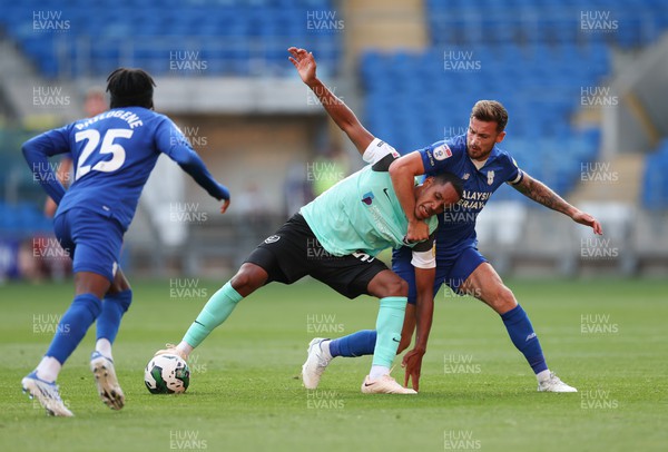 090822 - Cardiff City v Portsmouth, EFL Carabao Cup - Haji Mnoga of Portsmouth and Joe Ralls of Cardiff City compete for the ball