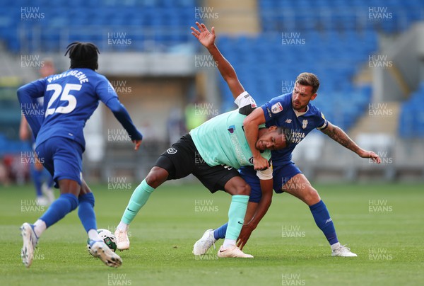 090822 - Cardiff City v Portsmouth, EFL Carabao Cup - Haji Mnoga of Portsmouth and Joe Ralls of Cardiff City compete for the ball