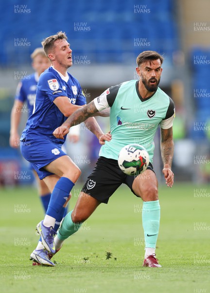 090822 - Cardiff City v Portsmouth, EFL Carabao Cup - Gavin Whyte of Cardiff City challenges Marlon Pack of Portsmouth