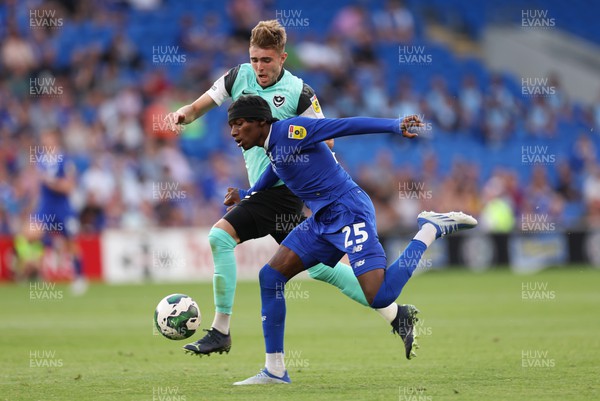 090822 - Cardiff City v Portsmouth, EFL Carabao Cup - Jaden Philogene of Cardiff City and Zak Swanson of Portsmouth compete for the ball