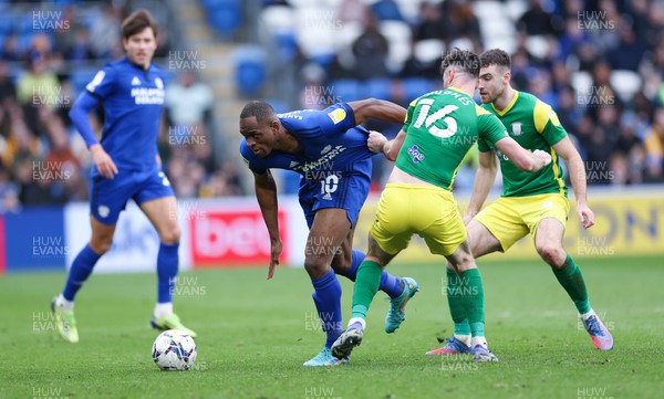 120322 Cardiff City v Preston North End, Sky Bet Championship - Andrew Hughes of Preston North End and Uche Ikpeazu of Cardiff City compete for the ball