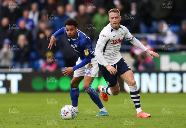 211219 - Cardiff City v Preston North End, Sky Bet Championship - Josh Murphy of Cardiff City and Tom Clarke of Preston North End compete for the ball