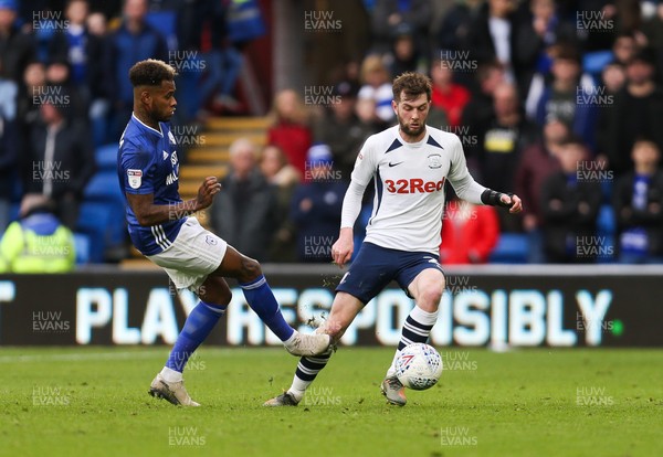 211219 - Cardiff City v Preston North End, Sky Bet Championship - Tom Barkhuizen of Preston North End is challenged by Leandro Bacuna of Cardiff City