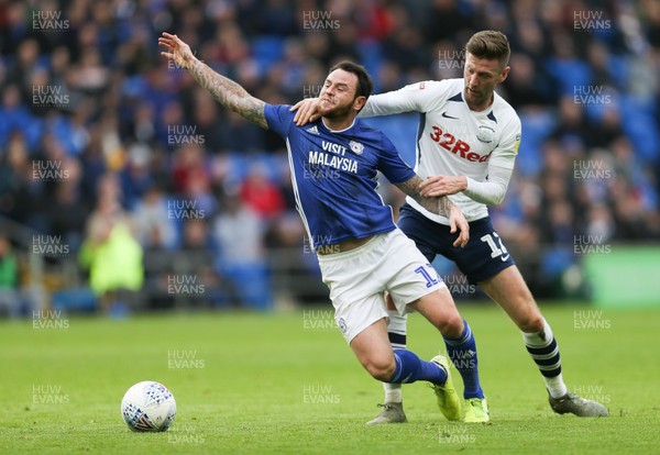 211219 - Cardiff City v Preston North End, Sky Bet Championship - Lee Tomlin of Cardiff City is brought down by Paul Gallagher of Preston North End