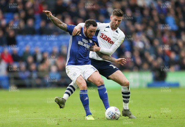 211219 - Cardiff City v Preston North End, Sky Bet Championship - Lee Tomlin of Cardiff City is brought down by Paul Gallagher of Preston North End