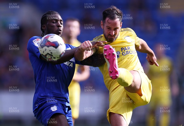 270822 - Cardiff City v Preston North End - SkyBet Championship - Sheyi Ojo of Cardiff City is challenged by Greg Cunningham of Preston North End