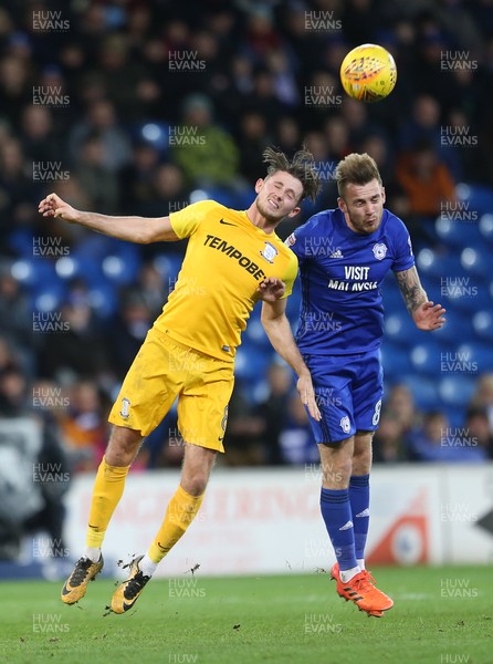 291217 - Cardiff City v Preston North End - SkyBet Championship - Alan Browne of Preston North End and Joe Ralls of Cardiff City go up for the ball