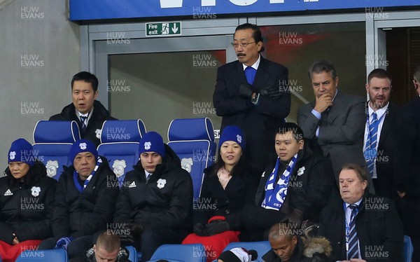 291217 - Cardiff City v Preston North End - SkyBet Championship - Cardiff City owner Vincent Tan (centre) with Cardiff City chief executive Ken Choo (left) and chairman Mehmet Dalman (right)