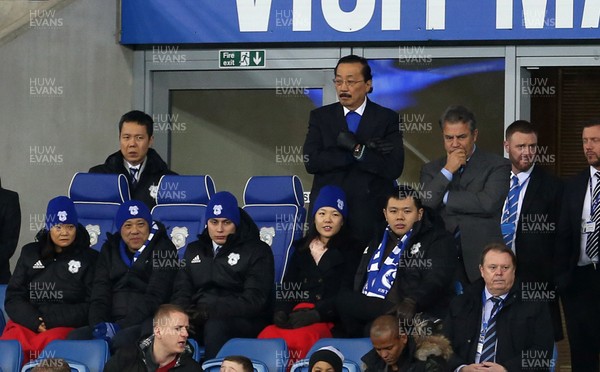 291217 - Cardiff City v Preston North End - SkyBet Championship - Cardiff City owner Vincent Tan (centre) with Cardiff City chief executive Ken Choo (left) and chairman Mehmet Dalman (right)
