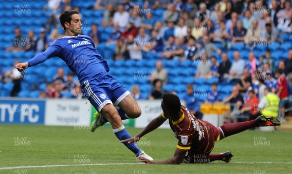 140816 - Cardiff City v Queens Park Rangers, Football League Championship - Peter Whittingham of Cardiff City is challenged by Yeni Ngbakoto of Queens Park Rangers