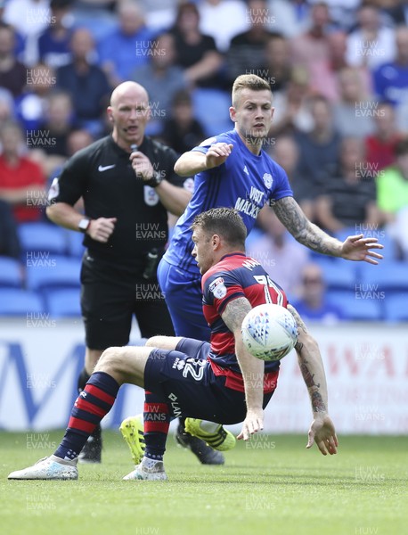 260817 - Cardiff City v Queens Park Rangers, Sky Bet Championship - Joe Ralls of Cardiff City gets the ball past Jamie Mackie of Queens Park Rangers