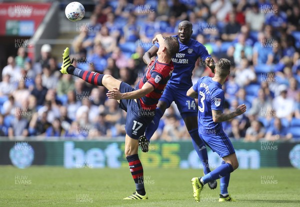 260817 - Cardiff City v Queens Park Rangers, Sky Bet Championship - Matt Smith of Queens Park Rangers and Sol Bamba of Cardiff City compete for the ball