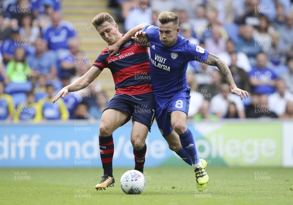 260817 - Cardiff City v Queens Park Rangers, Sky Bet Championship - Joe Ralls of Cardiff City is challenged by Luke Freeman of Queens Park Rangers