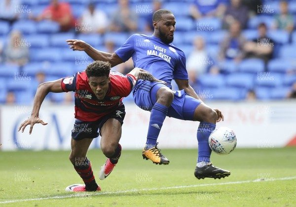 260817 - Cardiff City v Queens Park Rangers, Sky Bet Championship - Junior Hoilett of Cardiff City beats Darnell Furlong of Queens Park Rangers as he fires the ball into the net only for the goal to be ruled out