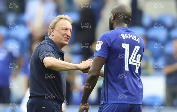 260817 - Cardiff City v Queens Park Rangers, Sky Bet Championship - Cardiff City manager Neil Warnock celebrates at the end of the match with Sol Bamba of Cardiff City