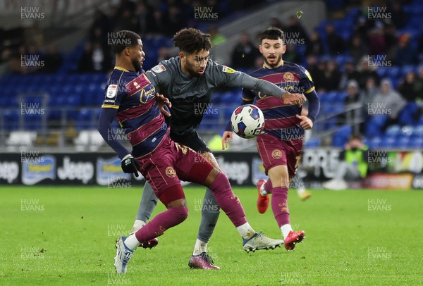 261222 - Cardiff City v Queens Park Rangers, EFL Sky Bet Championship - Kion Etete of Cardiff City is challenged by Kenneth Paal of Queens Park Rangers