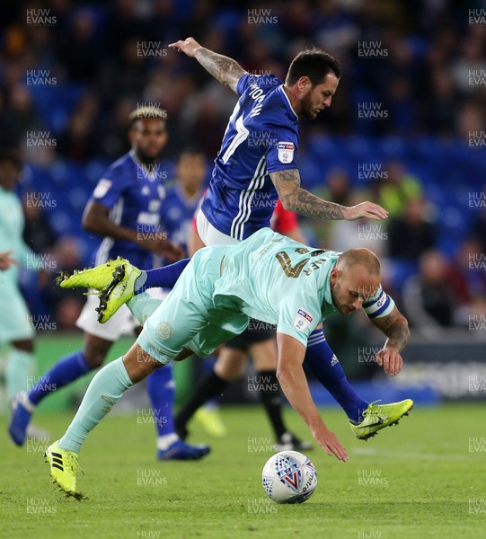 021019 - Cardiff City v Queens Park Rangers - SkyBet Championship - Toni Leistner of QPR is tackled by Lee Tomlin of Cardiff City