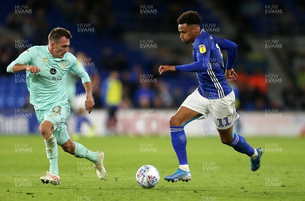 021019 - Cardiff City v Queens Park Rangers - SkyBet Championship - Josh Murphy of Cardiff City is challenged by Josh Scowen of QPR