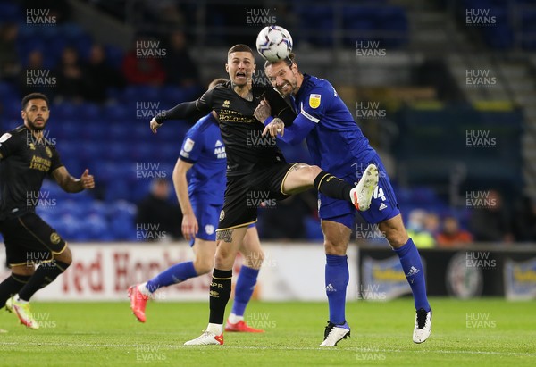 031121 - Cardiff City v Queens Park Rangers, Sky Bet Championship - Sean Morrison of Cardiff City and Lyndon Dykes of Queens Park Rangers compete for the ball