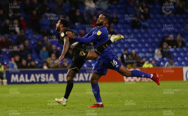 031121 - Cardiff City v Queens Park Rangers, Sky Bet Championship - Curtis Nelson of Cardiff City tangles with Andre Gray of Queens Park Rangers
