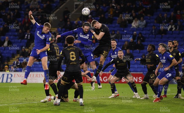 031121 - Cardiff City v Queens Park Rangers, Sky Bet Championship - Sean Morrison of Cardiff City and Jimmy Dunne of Queens Park Rangers compete to win the ball in the airf