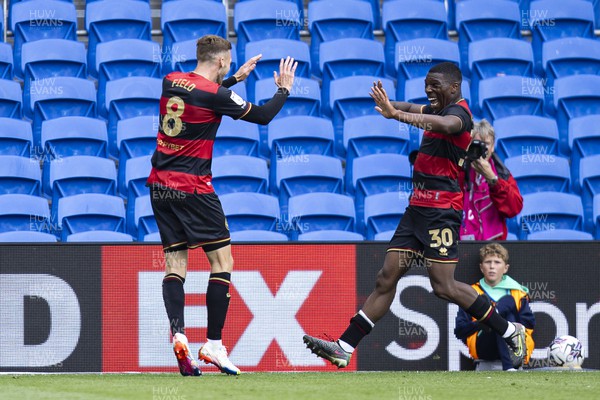 120823 - Cardiff City v Queens Park Rangers - Sky Bet Championship - Sam Field & Sinclair Armstrong of Queens Park Rangers celebrate their sides second goal scored by Kenneth Paal of Queens Park Rangers