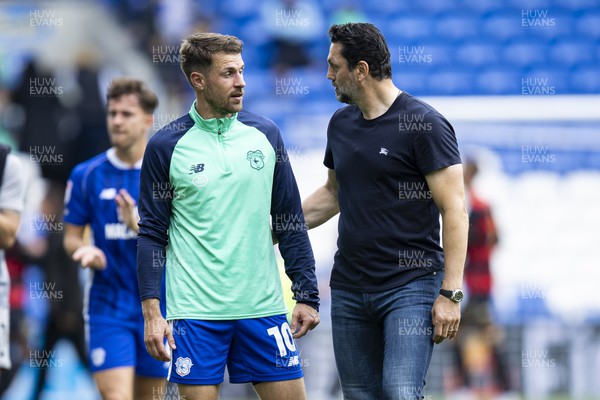 120823 - Cardiff City v Queens Park Rangers - Sky Bet Championship - Aaron Ramsey of Cardiff City with Cardiff City manager Erol Bulut at full time