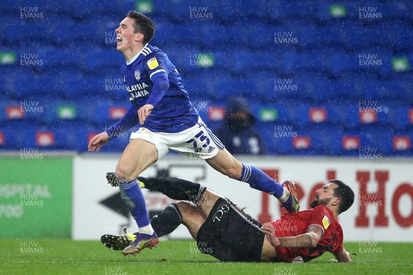 200121 - Cardiff City v Queens Park Rangers - SkyBet Championship - Harry Wilson of Cardiff City is tackled by Yoann Barbet of QPR