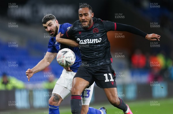 040220 - Cardiff City v Reading, FA Cup Round 4 Replay - Callum Paterson of Cardiff City and Jordan Obita of Reading compete for the ball
