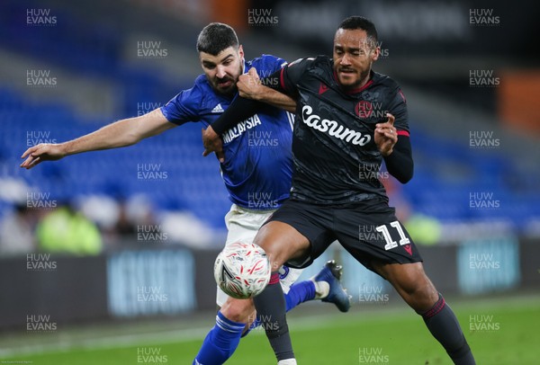 040220 - Cardiff City v Reading, FA Cup Round 4 Replay - Callum Paterson of Cardiff City and Jordan Obita of Reading compete for the ball
