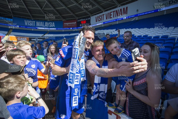 060518 - Cardiff City v Reading FC - SkyBet Championship - Sean Morrison of Cardiff City with the trophy has his picture with fans