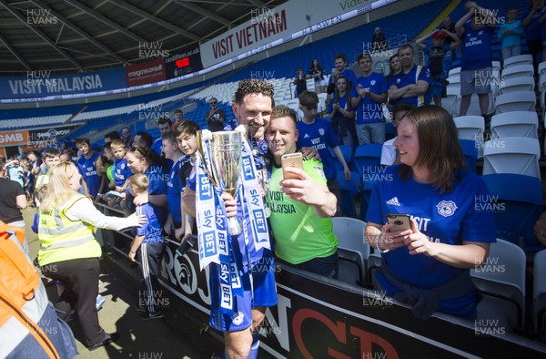 060518 - Cardiff City v Reading FC - SkyBet Championship - Sean Morrison of Cardiff City with the trophy has his picture with fans