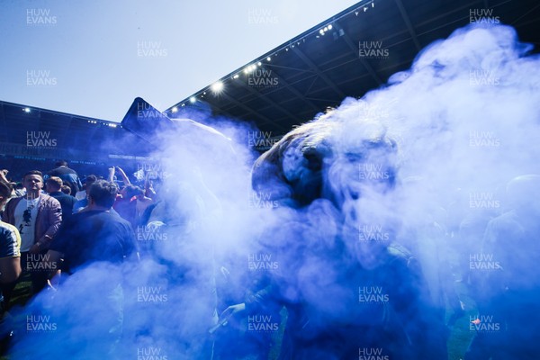 060518 - Cardiff City v Reading, Sky Bet Championship - Cardiff City fans celebrate with smoke flares after winning promotion to the Premier League